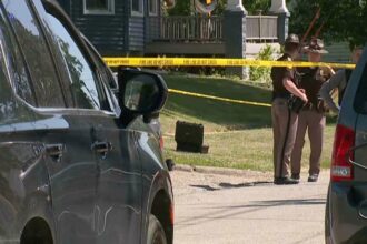 This image taken from video provided by WQAD, police investigate the fatal shootings of several people in Muscatine, Iowa. (Photo: AP)