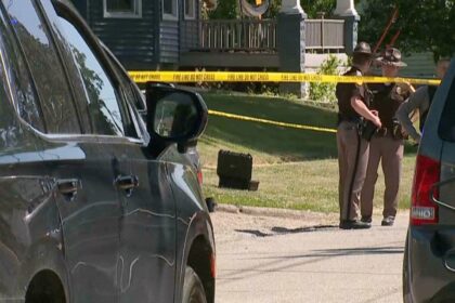 This image taken from video provided by WQAD, police investigate the fatal shootings of several people in Muscatine, Iowa. (Photo: AP)
