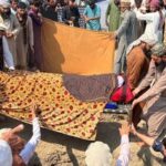 People move the bodies of victims killed in what the Taliban said was a Pakistani airstrike, before their burial in Kunar province, Afghanistan, on September 21, 2026. REUTERS/Stringer
