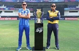 India captain Harmanpreet Kaur (L) and Sri Lanka skipper Chamari Athapaththu pose with the series trophy in Dubai on Saturday.