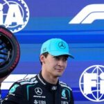 Mercedes driver George Russell of Britain celebrates after he clocked the fastest time during the qualifying session for the Azerbaijan F1 Grand Prix, in Baku, Azerbaijan.