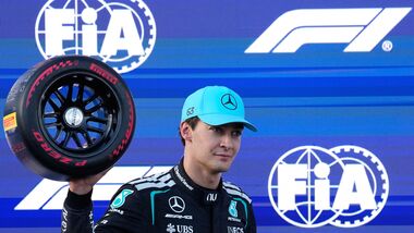 Mercedes driver George Russell of Britain celebrates after he clocked the fastest time during the qualifying session for the Azerbaijan F1 Grand Prix, in Baku, Azerbaijan.