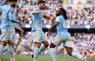 Manchester City's Antoine Semenyo, right, reacts after scoring third goal during the English Premier League soccer match between Manchester City and Sunderland in Manchester, England.