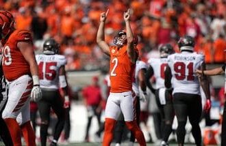 Cincinnati Bengals kicker Evan McPherson (2) celebrates after making a 32-yard field goal against the Tampa Bay Buccaneers in the second half of an NFL football game.