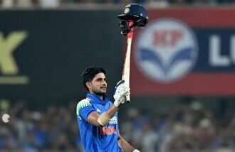 India's captain Shubman Gill celebrates after scoring a double-century (200 runs) during the second one-day international (ODI) cricket match between India and West Indies.