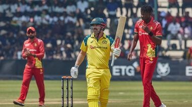 Australia's Travis Head celebrates after scoring a century during the second ODI against Zimbabwe in Harare on Friday.