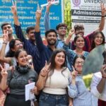 Students show victory signs amid the voting for the Delhi University Students' Union (DUSU) elections, at North Campus in New Delhi on Friday. (Inset: Independent candidate Deepanshu Shokeen.