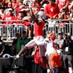 Jeremiah Smith #4 of the Ohio State Buckeyes catches a pass for a touchdown while being defended by Juice Clarke #6 of the Illinois Fighting Illini during the first quarter of the game at Ohio Stadium on September 26, 2026 in Columbus, Ohio.
