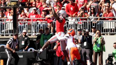 Jeremiah Smith #4 of the Ohio State Buckeyes catches a pass for a touchdown while being defended by Juice Clarke #6 of the Illinois Fighting Illini during the first quarter of the game at Ohio Stadium on September 26, 2026 in Columbus, Ohio.