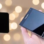 When folded, the iPhone Duo shares the exact physical footprint of a standard international passport—a deliberate design choice that inadvertently mirrors the BlackBerry Passport