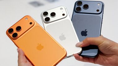 A person holds Apple’s new iPhone 17 series at an Apple Store