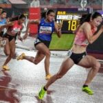 India's Harita Bhadra (C) in action during her women's 200m event at Asian Games 2026.