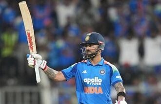 India's Virat Kohli celebrates his fifty runs during the first one day international cricket match between India and West Indies in Thiruvananthapuram, India.