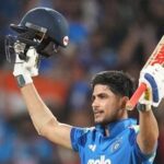 India's captain Shubman Gill celebrates his century during the first one day international cricket match between India and West Indies in Thiruvananthapuram, India.