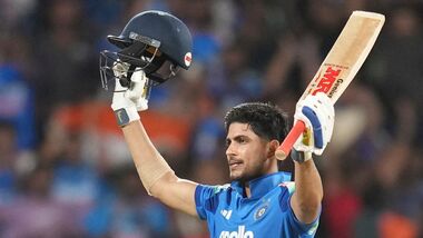India's captain Shubman Gill celebrates his century during the first one day international cricket match between India and West Indies in Thiruvananthapuram, India.