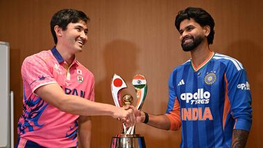 India's captain Shreyas Iyer (R) shakes hands with Japanese captain Kendel Kadowaki-Fleming in Tokyo.