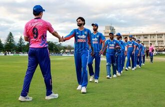 The Indian players shake hands with their Japanese counterparts after winning the historic one-off T20I in Sano.