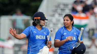 India's Shafali Verma (L) and Richa Ghosh after winning the quarterfinal against Japan at Asian Games 2026.