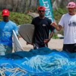 India’s surfing coach Samai Reboul (in white) along with his wards.