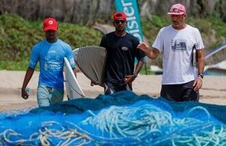 India’s surfing coach Samai Reboul (in white) along with his wards.