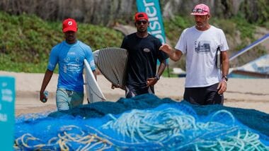 India’s surfing coach Samai Reboul (in white) along with his wards.