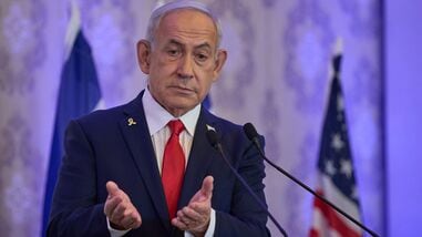 Israeli Prime Minister Benjamin Netanyahu speaks to the audience at a conference in Jerusalem, Sunday, July 27, 2025.