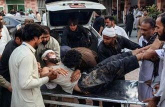 Suicide attack in Pakistan kills 12, injures 30 amid rising militant violence: Pakistani Taliban claims responsibility (Photo by Mohammad Kashif/AFP)