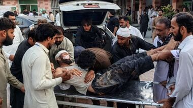 Suicide attack in Pakistan kills 12, injures 30 amid rising militant violence: Pakistani Taliban claims responsibility (Photo by Mohammad Kashif/AFP)