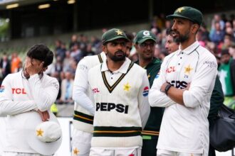 Pakistan's Babar Azam, center, with teammates following his side's 0-3 defeat to England in the recent Test series.