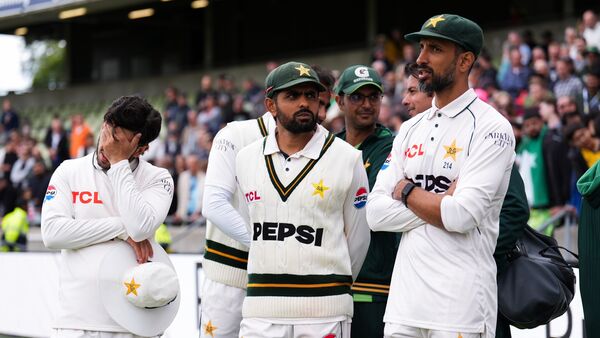 Pakistan's Babar Azam, center, with teammates following his side's 0-3 defeat to England in the recent Test series.