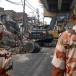 Jammu: Security personnel at the site as a demolition drive being carried out by district administration at Nai basti area, in Jammu, Jammu and Kashmir, Friday, Sept. 11, 2026. (PTI Photo)(PTI09_11_2026_000029A)
