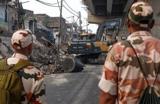 Jammu: Security personnel at the site as a demolition drive being carried out by district administration at Nai basti area, in Jammu, Jammu and Kashmir, Friday, Sept. 11, 2026. (PTI Photo)(PTI09_11_2026_000029A)