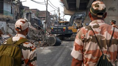 Jammu: Security personnel at the site as a demolition drive being carried out by district administration at Nai basti area, in Jammu, Jammu and Kashmir, Friday, Sept. 11, 2026. (PTI Photo)(PTI09_11_2026_000029A)