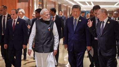 Prime Minister Narendra Modi interacts with Russian President Vladimir Putin and Chinese President Xi Jinping during the 18th BRICS Summit in New Delhi.