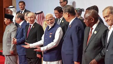 Prime Minister Narendra Modi with Russian President Vladimir Putin, Chinese President Xi Jinping, Iranian President Masoud Pezeshkian, Egyptian President Abdel Fattah el-Sisi, Indonesian President Prabowo Subianto, South African President Cyril Ramaphosa and others during a group photograph at the 18th BRICS Summit, in New Delhi.