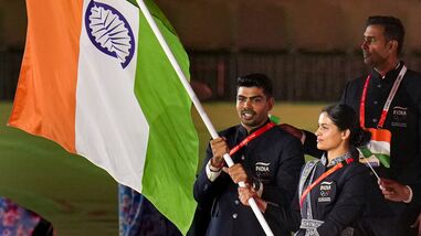 India's Pawan Sehrawat (Left) and Manu Bhaker (Right) led the country's athletes during the Asian Games 2026 opening ceremony in Nagoya, Japan on Saturday.