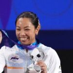 India's Mirabai Chanu poses with her silver medal at the 2026 Asian Games in Nagoya.