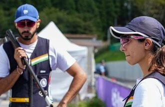 India's Parinaaz Dhaliwal, right, and Anant Jeet Singh Naruka won bronze in the Skeet Mixed Team event during the 20th Asian Games in Nagoya on Thursday.