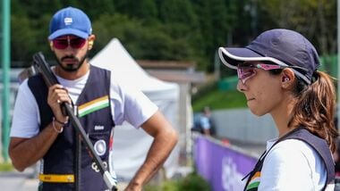 India's Parinaaz Dhaliwal, right, and Anant Jeet Singh Naruka won bronze in the Skeet Mixed Team event during the 20th Asian Games in Nagoya on Thursday.