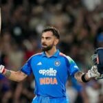 India's Virat Kohli celebrates his century during the first One Day International (ODI) cricket match between India and West Indies, in Thiruvananthapuram.
