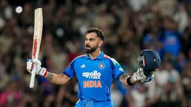 India's Virat Kohli celebrates his century during the first One Day International (ODI) cricket match between India and West Indies, in Thiruvananthapuram.
