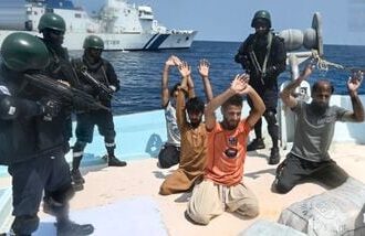 Security personnel detain five Pakistani nationals and seized 526 kg of methamphetamine and heroin valued at more than  ₹3,000 crore from an Iranian boat in the Arabian Sea, after a joint operation by the Indian Coast Guard (ICG) and Gujarat Anti-Terrorism Squad (ATS) near Lakshadweep. (@IndiaCoastGuard/X via PTI Photo)