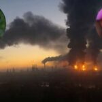 Smoke columns rise after strikes in an oil refinery in Moscow, Russia, September 20, 2026. (Inset: Volodymyr Zelensky (L), Donald Trump (R)).
