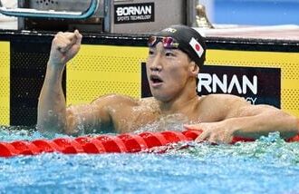 Japan's Shin Ohashi celebrates winning gold in the Men's 200m Breaststroke final at Asian Games 2026.
