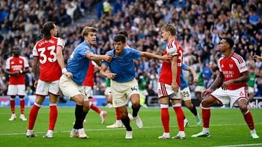 Brighton and Hove Albion's Chema Andres celebrates scoring their third goal with Luka Vuskovic