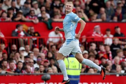 Manchester City's Erling Haaland celebrates scoring their first goal following a VAR review
