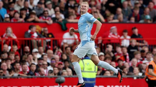 Manchester City's Erling Haaland celebrates scoring their first goal following a VAR review