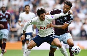 Tottenham Hotspur's Sandro Tonali in action with Aston Villa's Boubacar Kamara