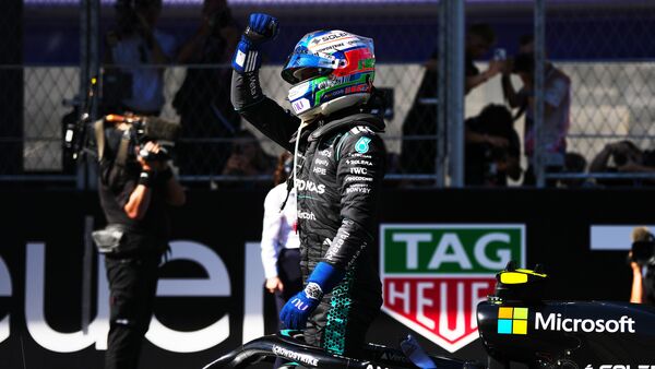 Mercedes driver Andrea Kimi Antonelli of Italy celebrates after winning the Spanish Formula One Grand Prix race in Madrid.