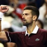 Serbia's Novak Djokovic celebrates after winning his round of 32 match against Portugal's Nuno Borges.